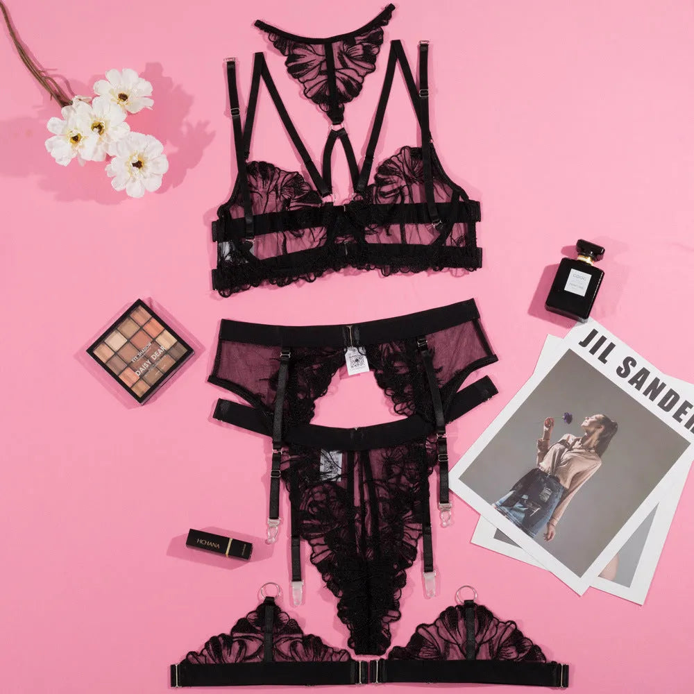 Black women's bikini set with embroidery stitching on mesh material, three-point style design