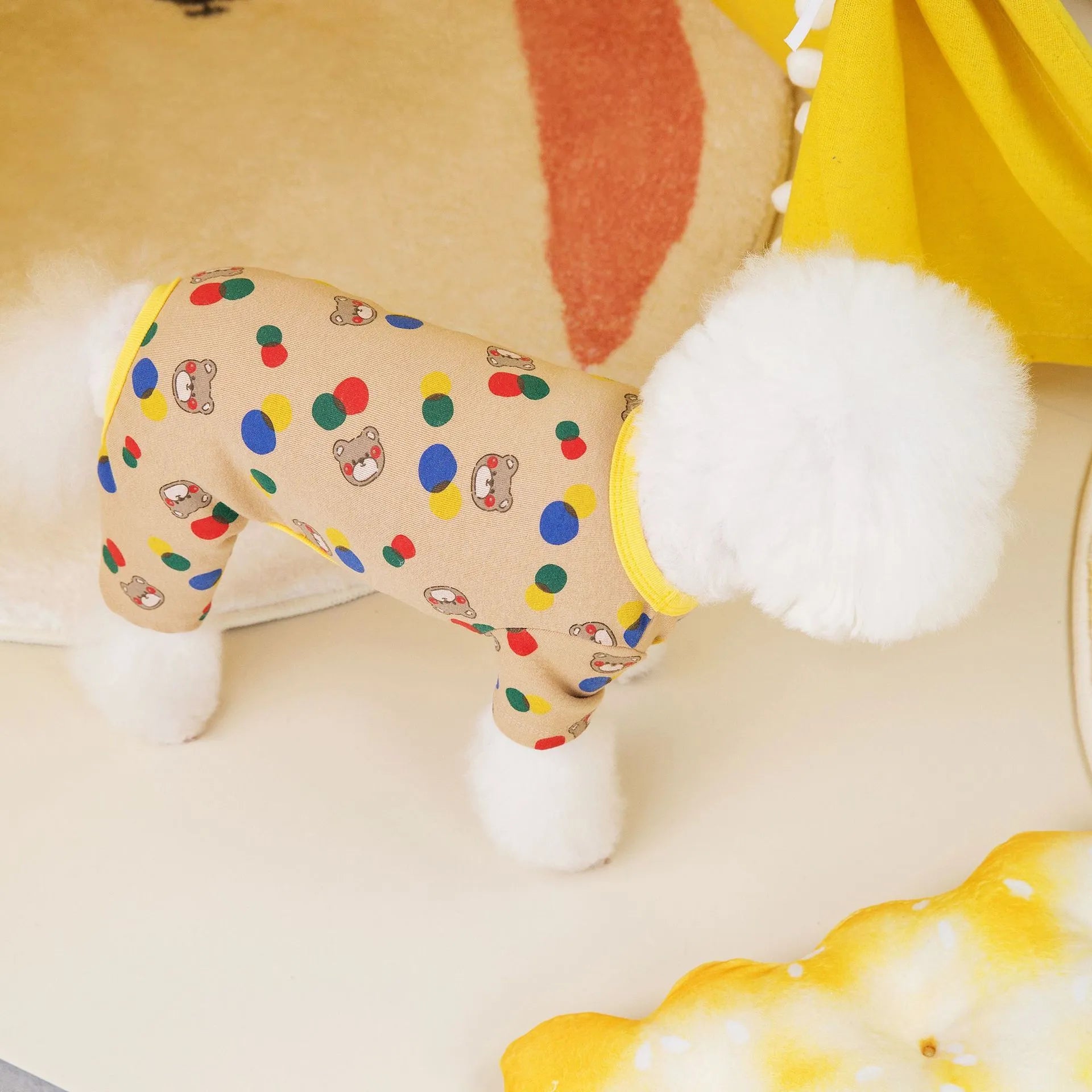 Beige dog clothing with colourful ball bear design, made from cotton and spandex blend, size L shown.