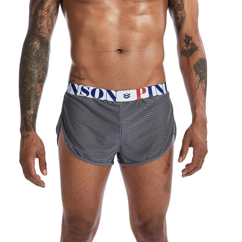 Men's solid colour breathable mesh boxer briefs on a mid waist, showing the fabric texture.