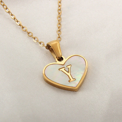 Personalized heart-shaped white shell necklace with adjustable clavicle chain, a stylish and versatile jewelry piece for women