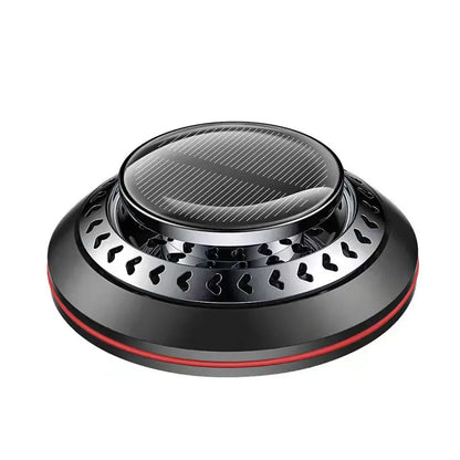 Solar-powered aluminium car air purifier with essential oil bottle and beech wood chips for odour removal.