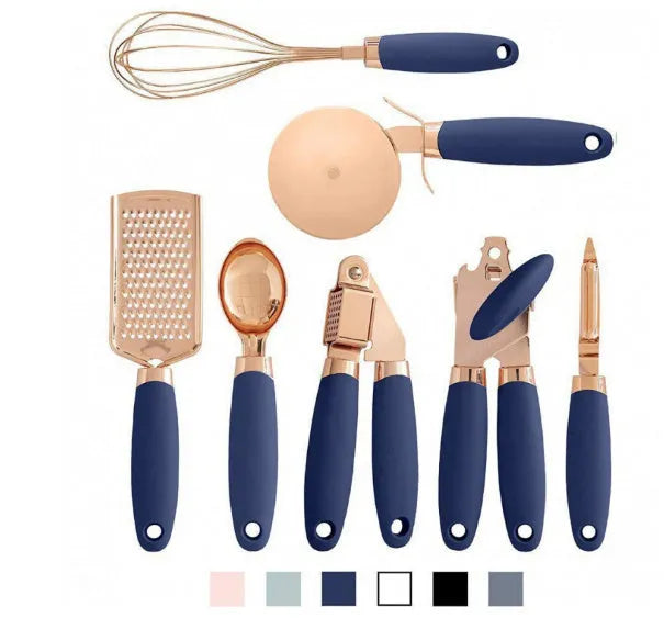 7-piece stainless steel kitchen tool set with copper finish on a countertop storage rack.