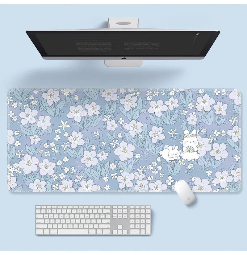 Large cartoon flower pattern mouse pad with non-slip rubber base on desk