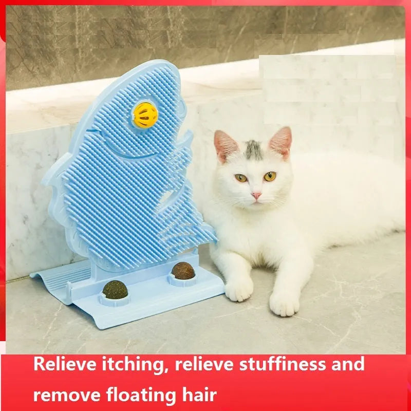 Blue plastic fish-shaped cat wall scratcher with grooming brush, catnip balls, and bell