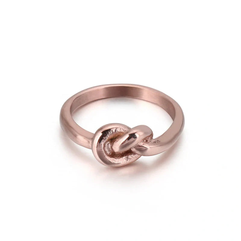 Elegant Truelove Knot Titanium Steel Ring in gold and rose gold finishes