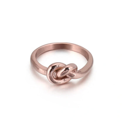 Elegant Truelove Knot Titanium Steel Ring in gold and rose gold finishes