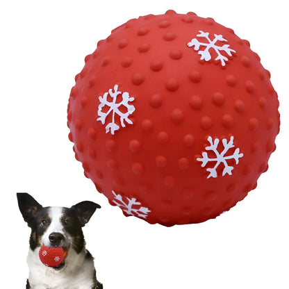 Red and green Christmas snowflake print dog chew ball with air vents, approx 7cm diameter.