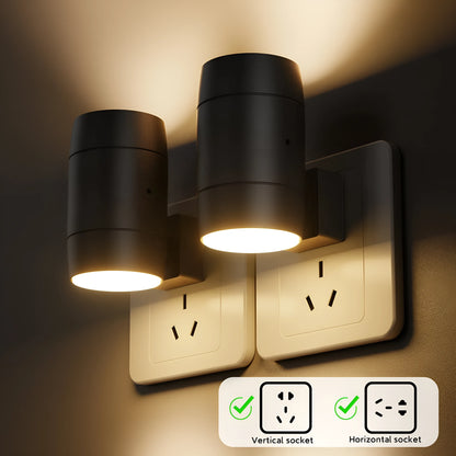 White adjustable brightness rotating induction night lamp showing light head rotation and plug