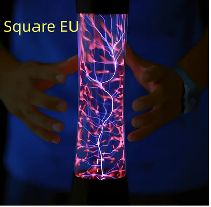 Plasma lightning ball with electrostatic induction showing colourful electrical discharges on glass surface