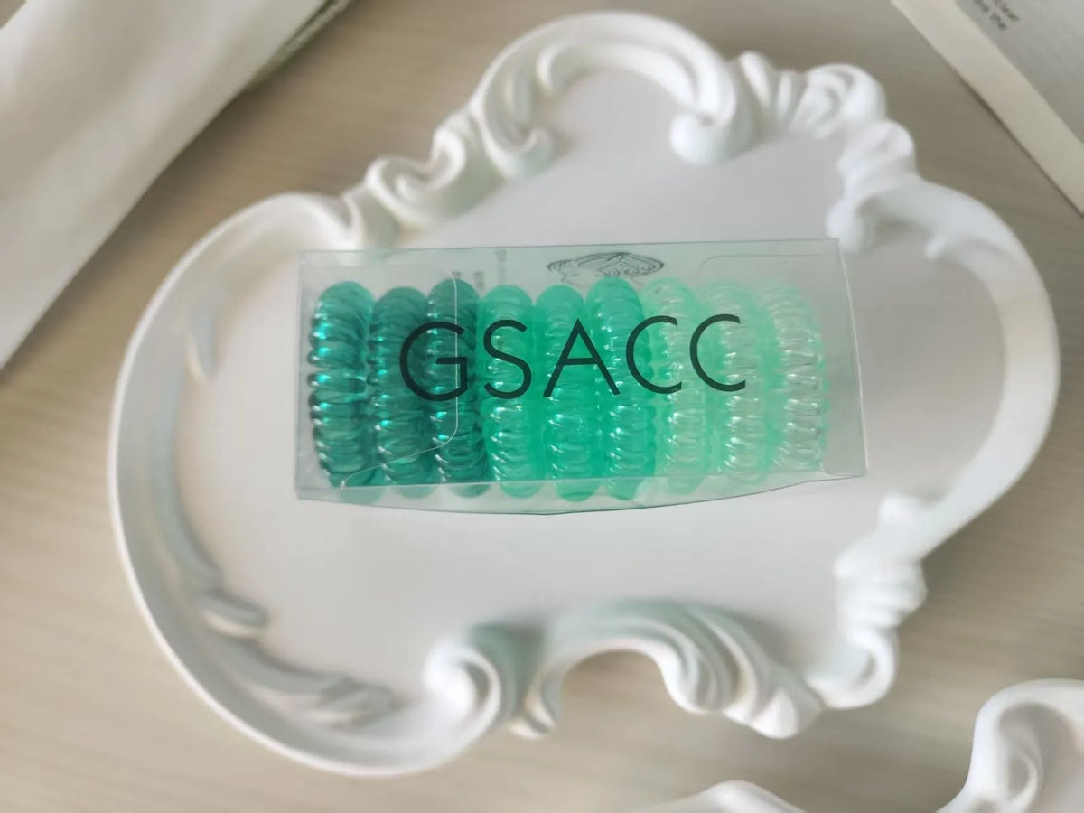 Set of 9 TPU traceless hairbands in various colours for phone cable organisation