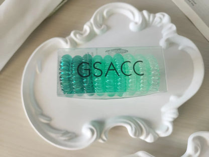 Set of 9 TPU traceless hairbands in various colours for phone cable organisation