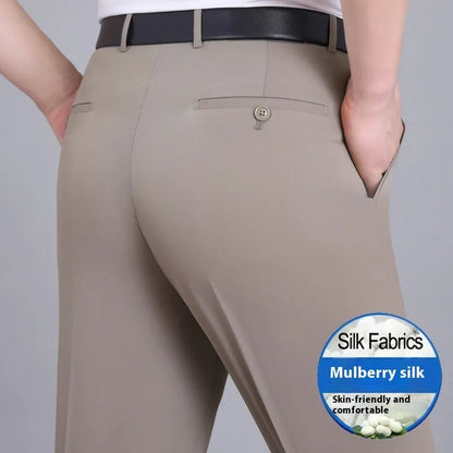 Man wearing dark blue straight-leg non-iron business trousers with a mulberry silk blend fabric.