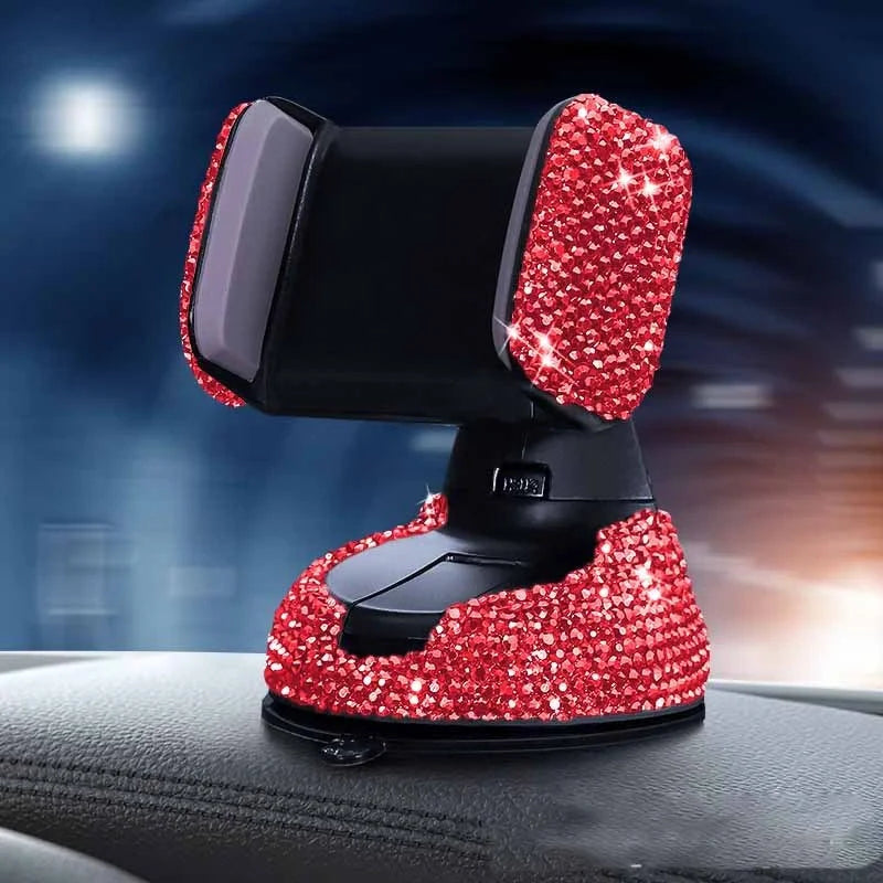 Diamond-encrusted car phone holder mounted on air vent with smartphone securely attached