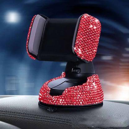 Diamond-encrusted car phone holder mounted on air vent with smartphone securely attached