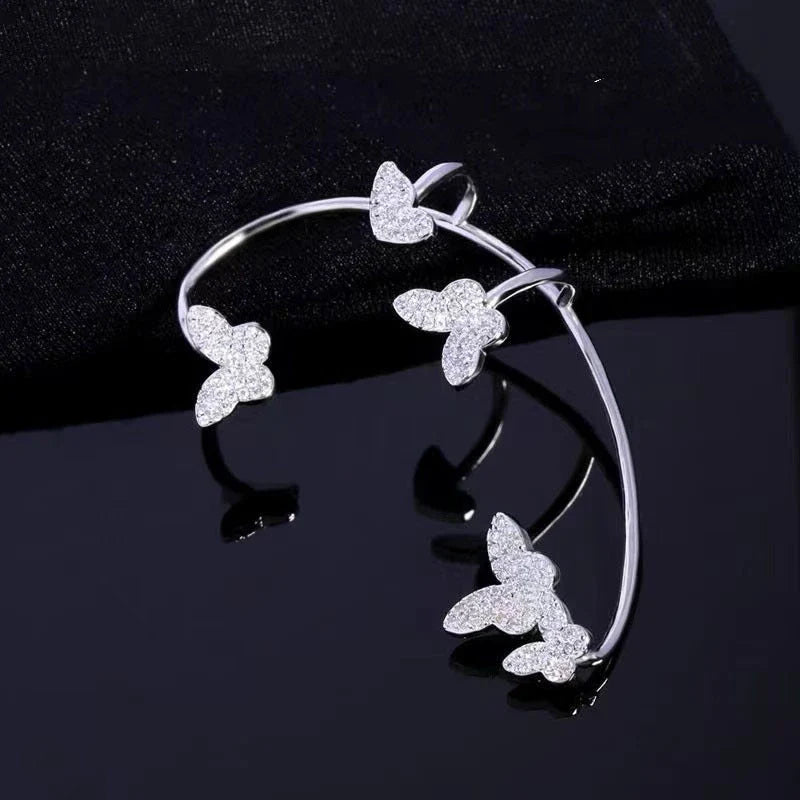 Elegant gold-plated butterfly ear cuffs with sparkling zircon accents, perfect for women's fashion and accessorizing