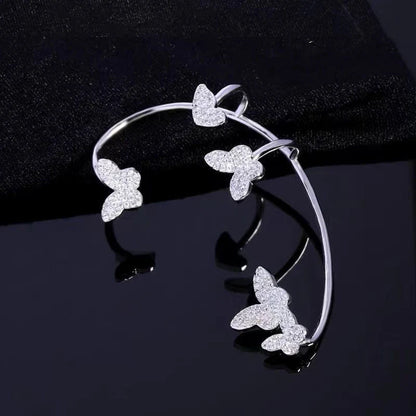 Elegant gold-plated butterfly ear cuffs with sparkling zircon accents, perfect for women's fashion and accessorizing