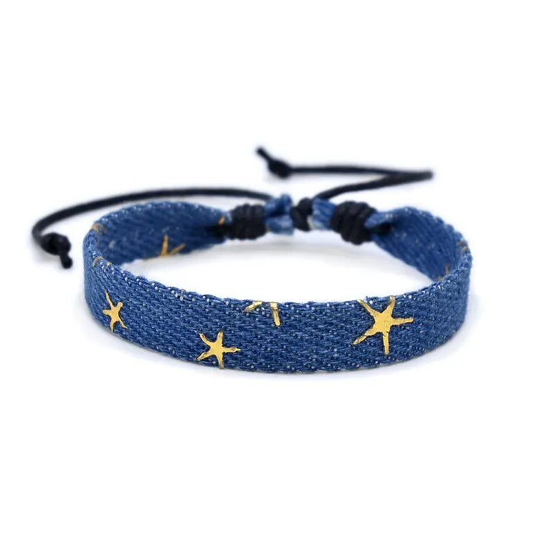 National style denim fabric bracelet carrying strap showing mixed material construction and wristband design