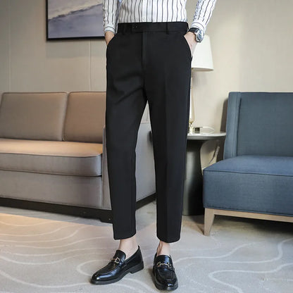 Straight-leg brown corduroy trousers with elastic waistband on size chart