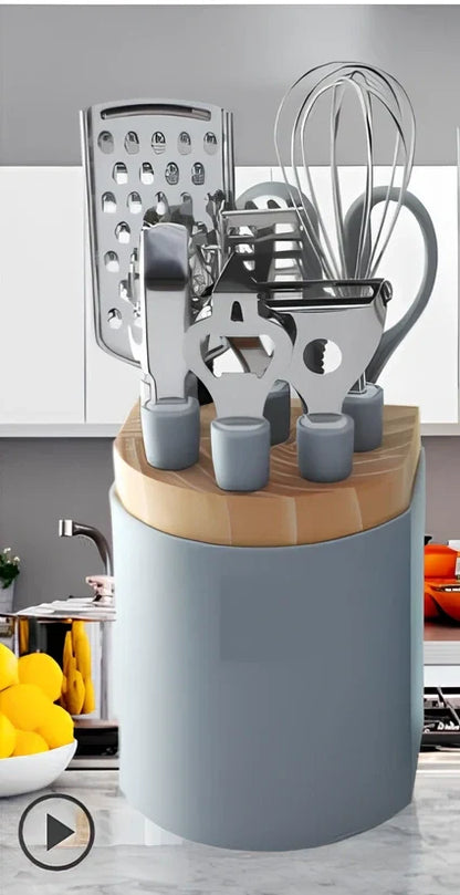 6-piece grey stainless steel kitchen utensil set with whisk, peeler, scissors on white background, essential for quick prep