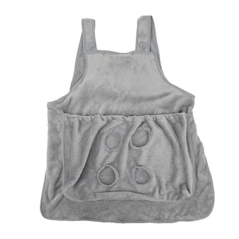Beige plush pet carrier apron with adjustable neck strap and fresh air opening for small cat or dog