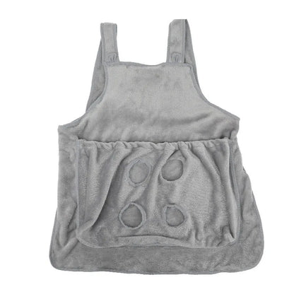 Beige plush pet carrier apron with adjustable neck strap and fresh air opening for small cat or dog