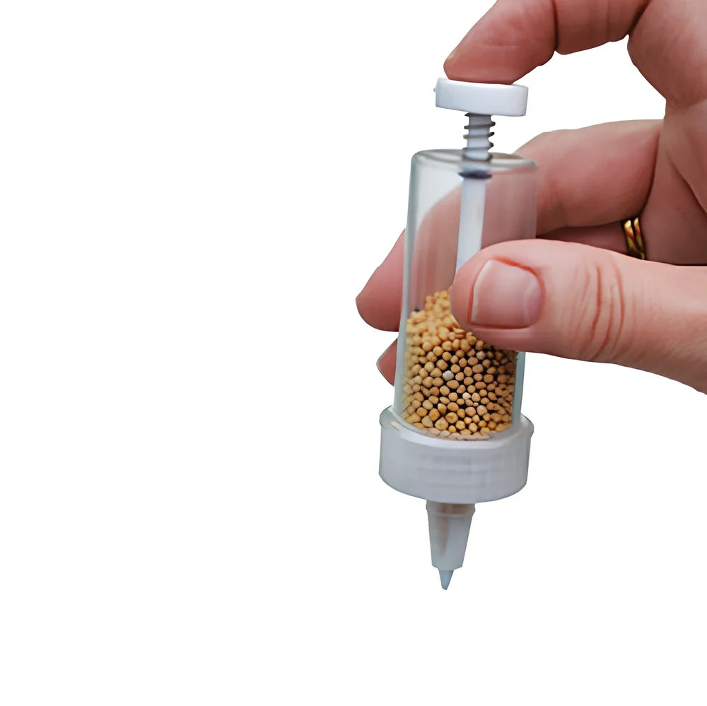12cm long plastic mini planter tool with 3cm diameter opening for seed distribution