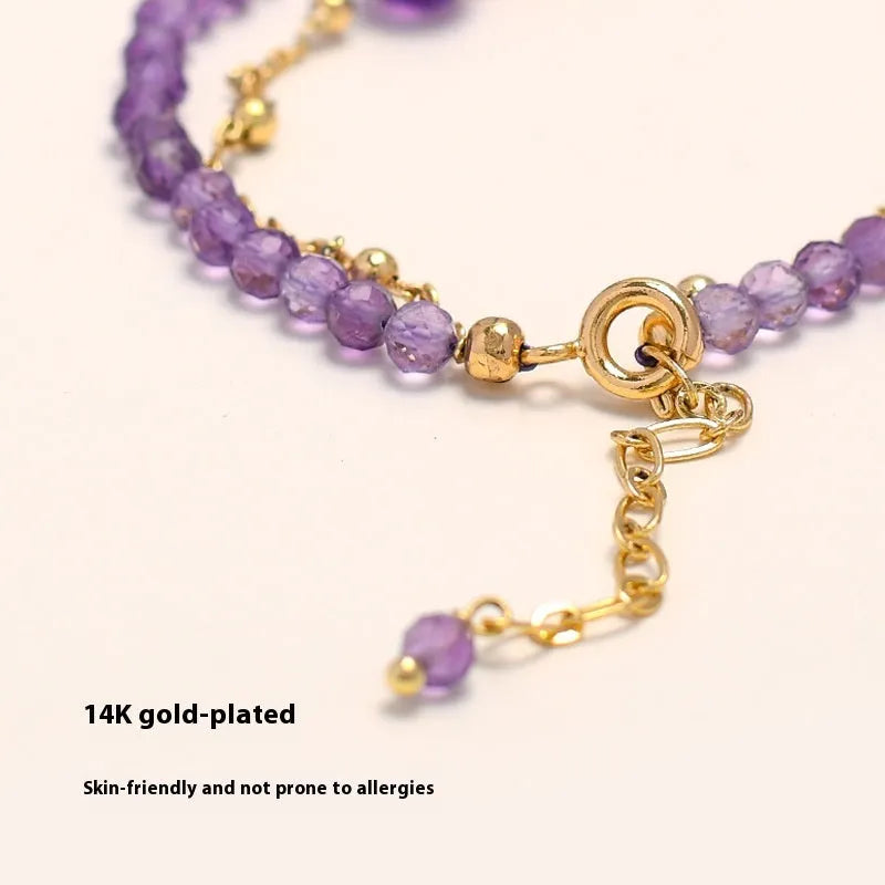 Amethyst coloured Chinese-style crystal bracelet with a diamond-shaped design and electroplated finish.