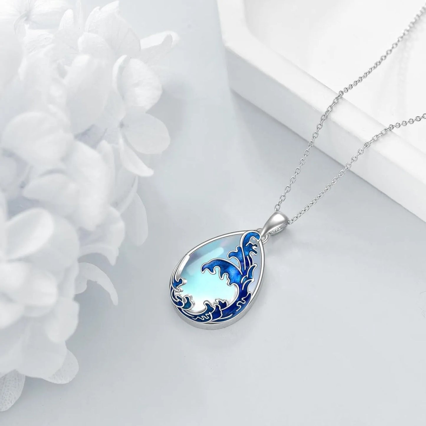 Blue heart-shaped alloy pendant necklace with adjustable 45-50cm chain on display