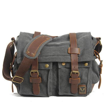 Men's canvas crossbody shoulder bag with cowhide accents and flap closure in retro postman style