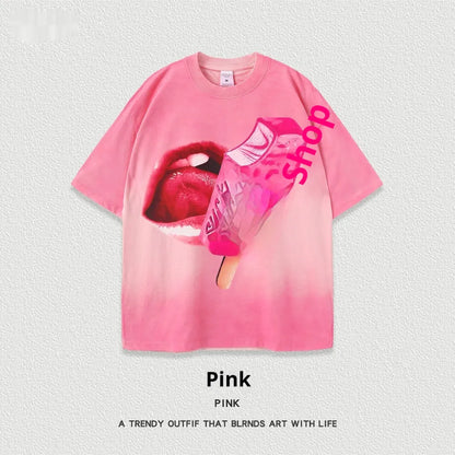 A loose-fit heavy washed cotton T-shirt with a cartoon print, shown in a selection of available colours.