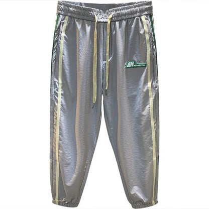 Men's grey cotton blend harem pants with elastic waistband and loose leg design