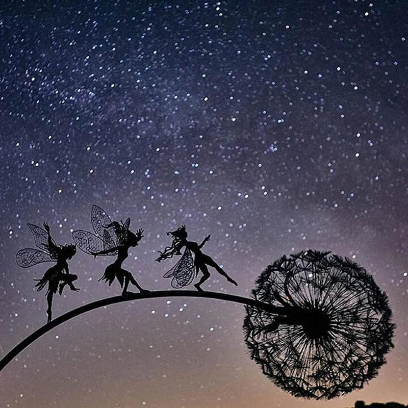 Enchanting fairy garden sculptures made of metal, featuring playful designs of fairies and pixies among dandelions and flowers.
