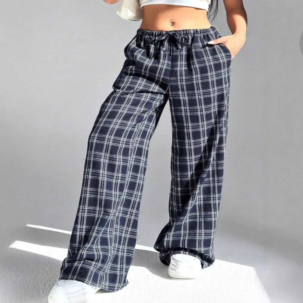 Women's loose fit trousers with drawstring waist and plaid pattern pockets in blue colour