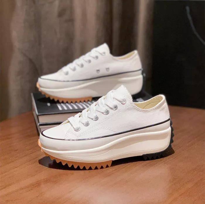 Women's thick-soled canvas shoes in white, black, and black high top options