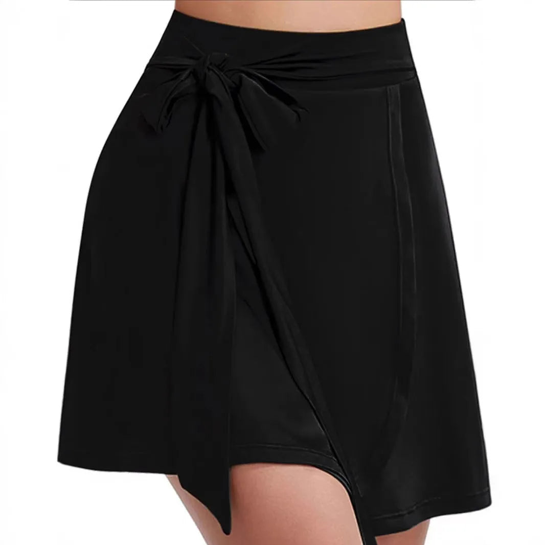 Black thigh-length unisex sports skirt with high waist and adjustable shoulder strap
