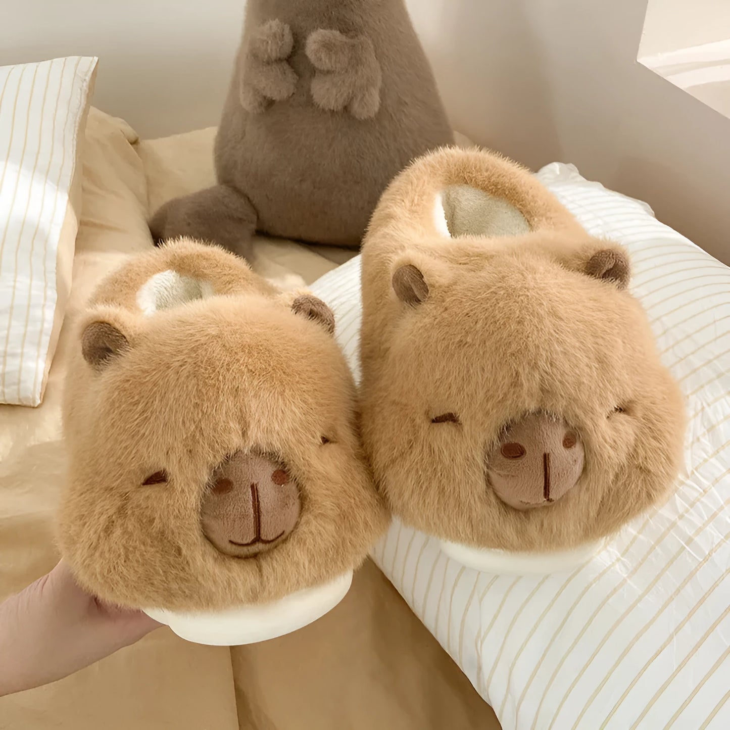 Light brown women's fleece slippers with round toe design and PVC sole