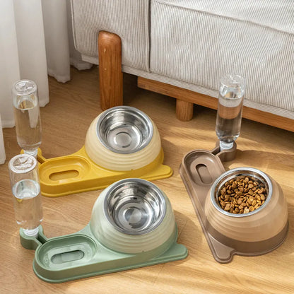 Brown elevated pet feeding bowl with attached water bottle for cats and small dogs on a wooden floor.