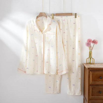 Women's cotton crepe pajama set in pink or beige with long sleeves and thin lightweight fabric