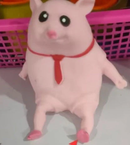 Adorable piggy-shaped stress relief toy made of eco-friendly rubber with a charming red scarf design