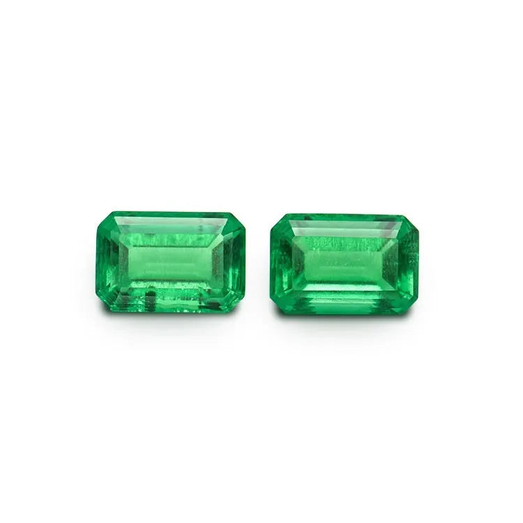 Cultivated emerald gemstone in Columbia green treasure colour showing round and grandmother cut shapes