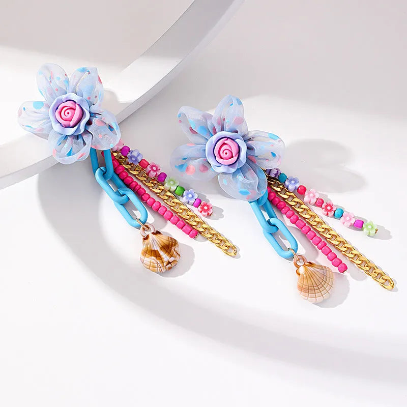 Handmade bohemian shell tassel earrings for women with colourful flower and geometric drop design