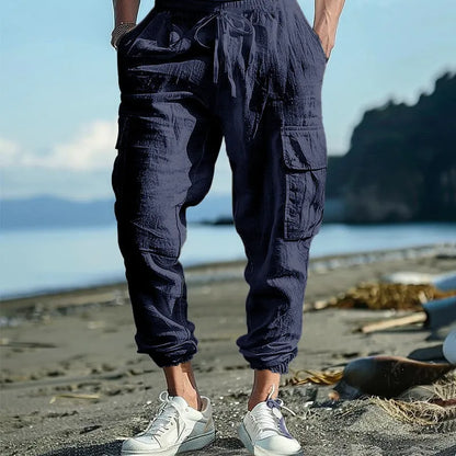 Men's linen casual trousers with adjustable ankle ties and four pockets in khaki colour