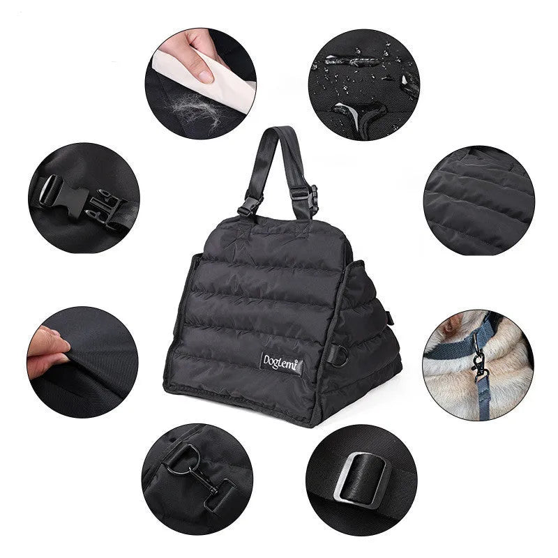 Black polyester dog car travel bag attached to car seat with seatbelt clip