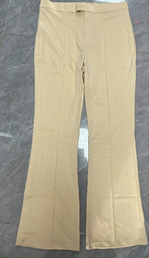 Chic slim-fit trousers with stylish buckle accent, available in a range of versatile colours for the modern British fashion enthusiast.