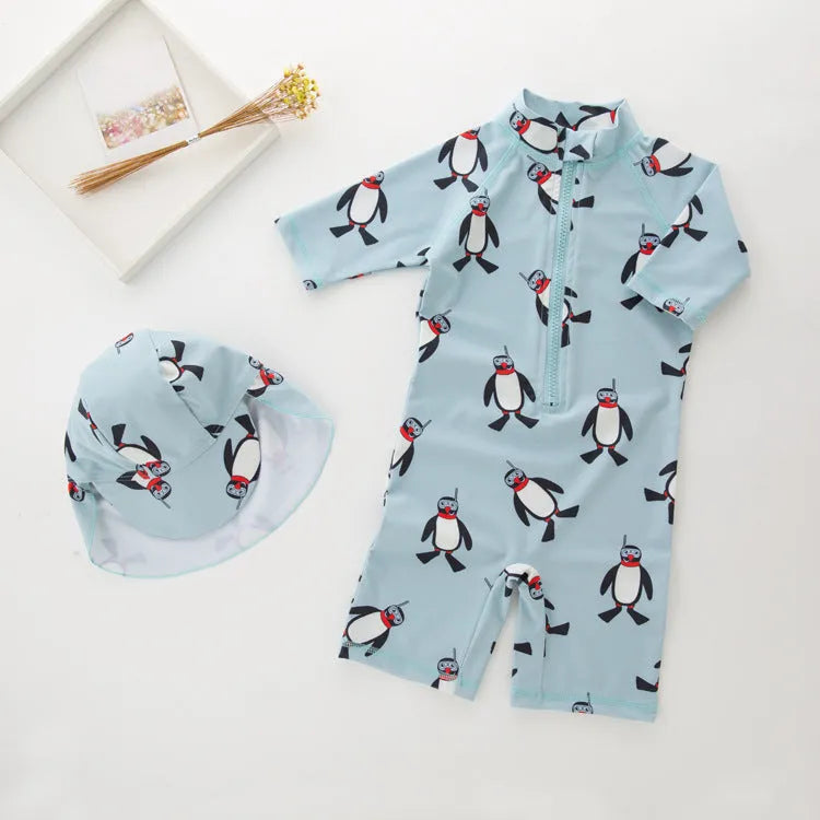 Boy's penguin-print long sleeve swimsuit with matching swimming cap for sun protection