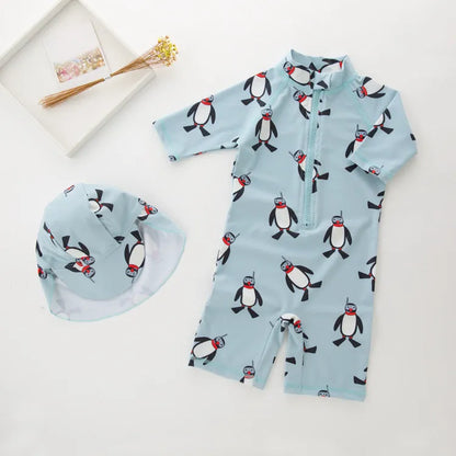 Boy's penguin-print long sleeve swimsuit with matching swimming cap for sun protection