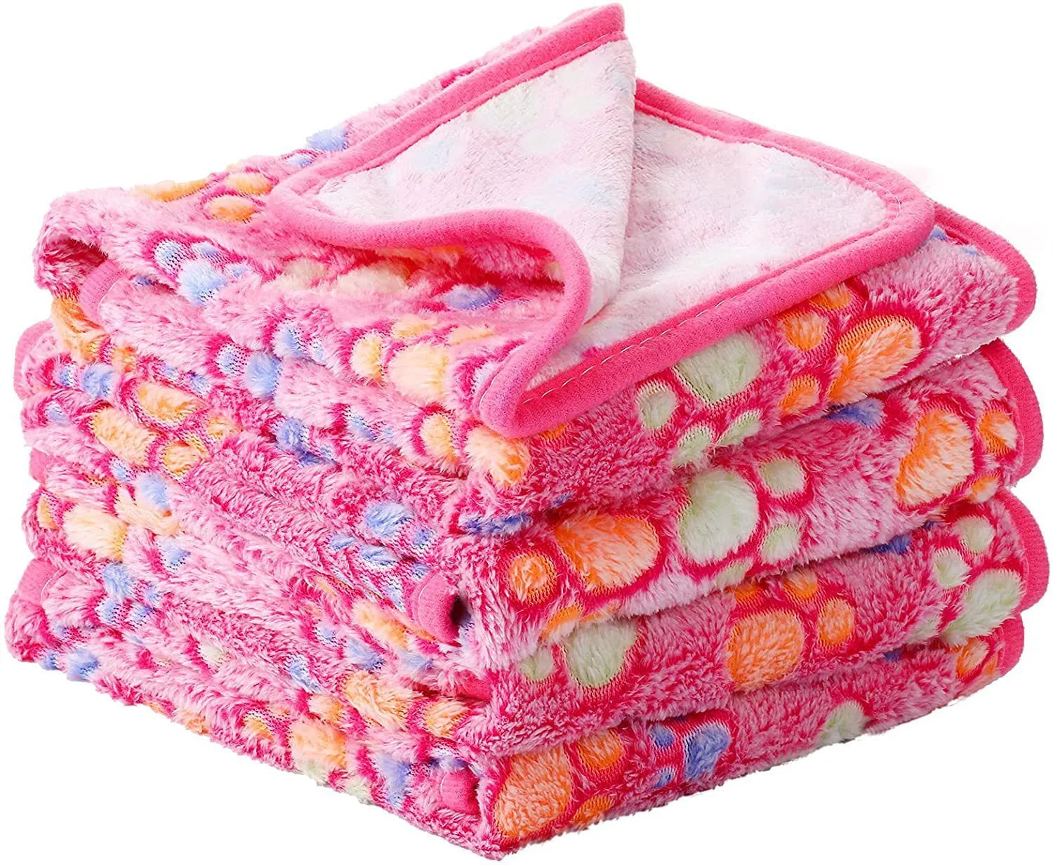 Coral fleece dog blanket with paw print pattern, shown in beige colour, laid flat to show size and soft texture.