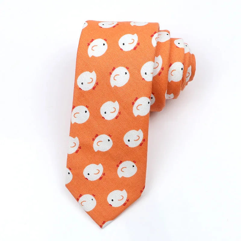 Korean style narrow men's cotton bow tie with a printed cartoon pattern on an adjustable fabric strap.