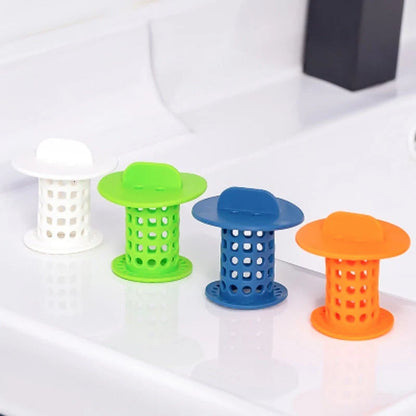 Anti-clogging plastic sink filter in blue, green, orange, and white