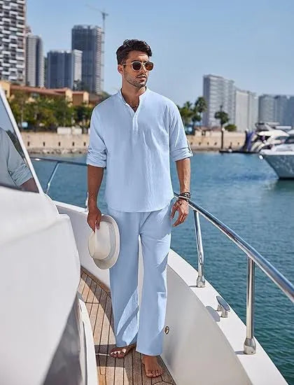 Men's casual cotton suit in a solid colour, featuring a long sleeve top and full-length trousers.